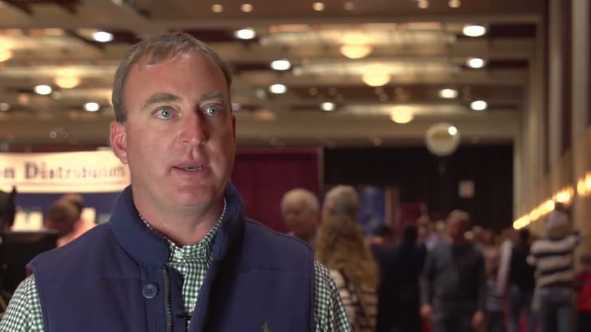 father and son in a corn field